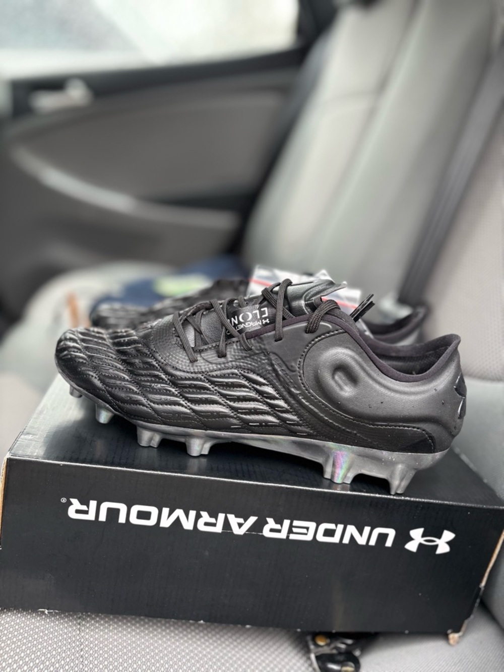Under Armour Black Soccer Cleats with Silver Studs